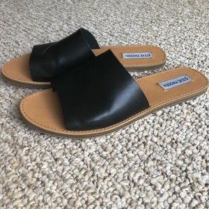 Women’s black leather slides